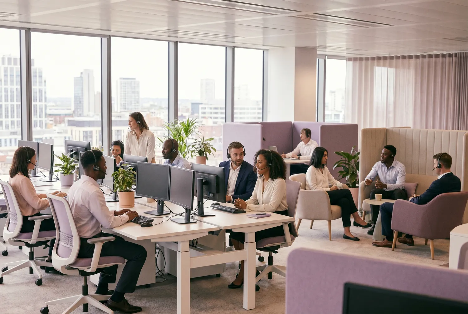 A busy BPO operations floor with service teams at workstations across an open office, the kind of headcount-driven operation that hires continuously.